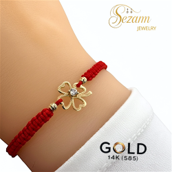 гривна червен конец и 14 карата  златна детелина и 2  златни  мъниста